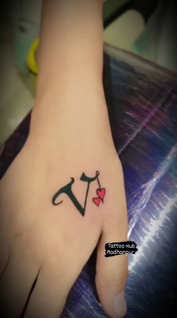 V letter tattoo  V letter tattoo Tattoo lettering Triangle tattoo